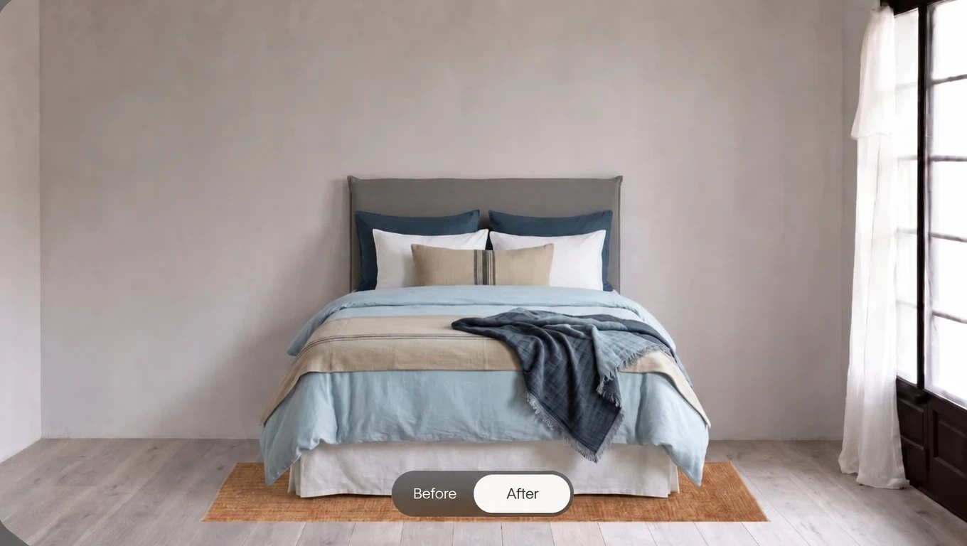 Look of a dressed bed with a light blue duvet cover, blue pillows, a long cushion and a throw, on a rug